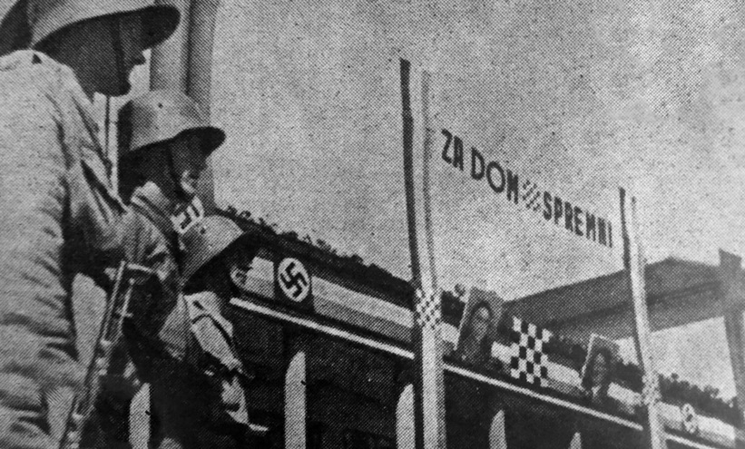Za_dom_spremni-_uz_svastike_Hitlera_Pavelića_i_ustaški_grb.jpg